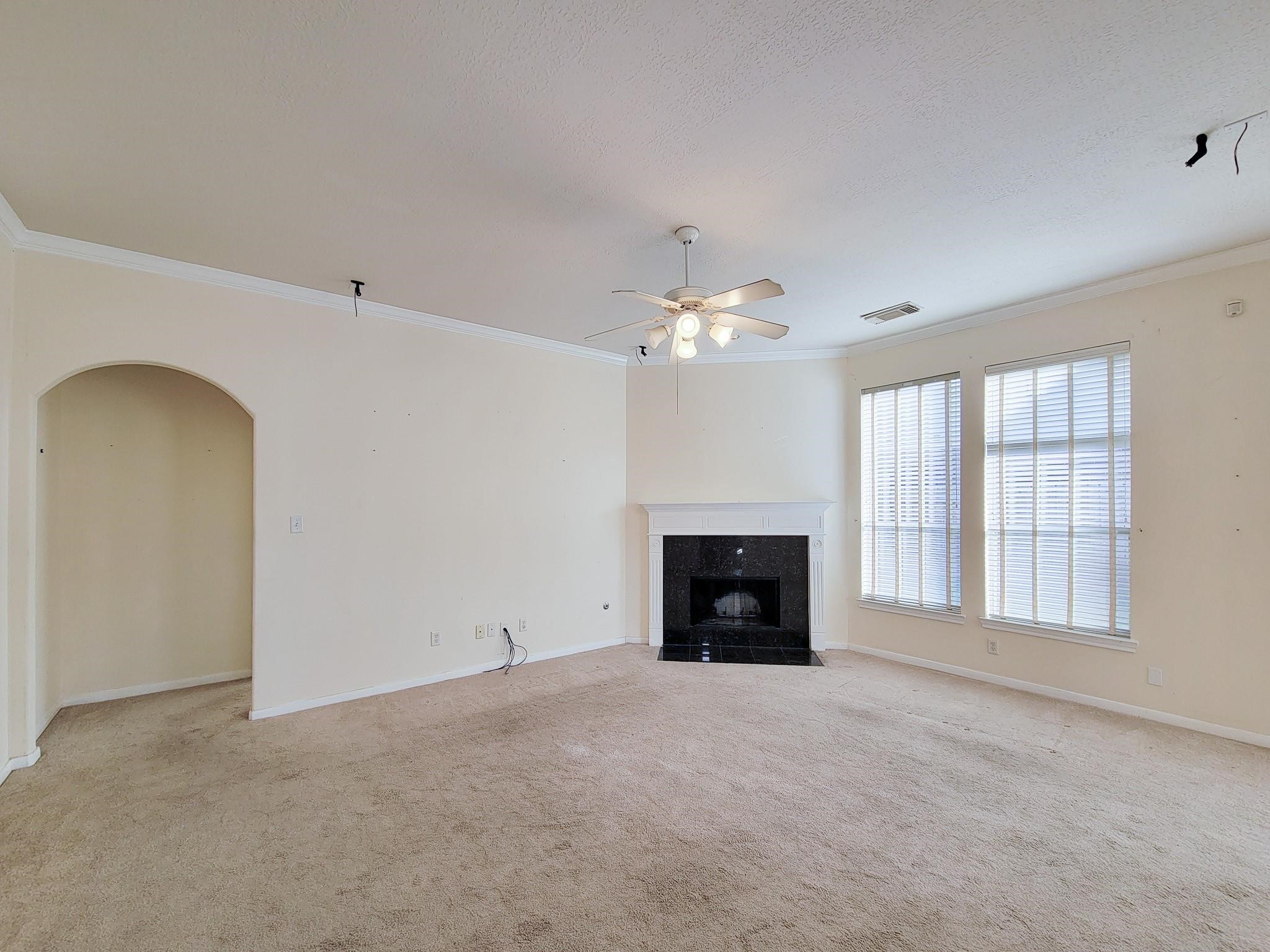 13935 Charterhouse Way Sugar Land, TX 77498 - Photo 6 of 36 a view of empty room with a fireplace