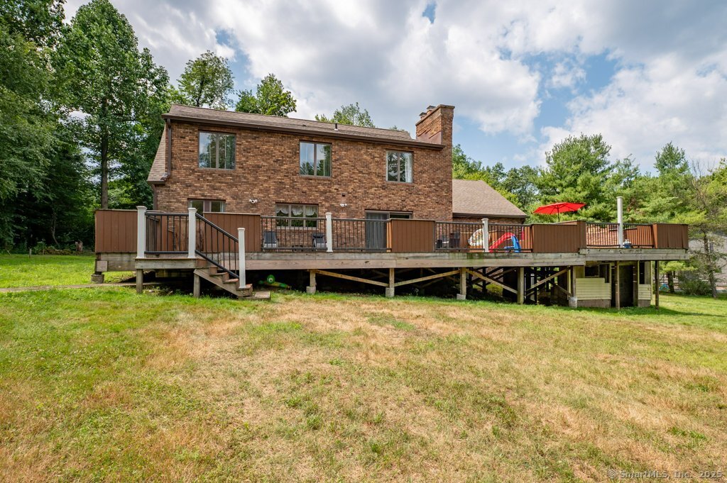 78 Blue Hills Road North Haven, CT 06473 - Photo 19 of 40 a view of a house with a backyard