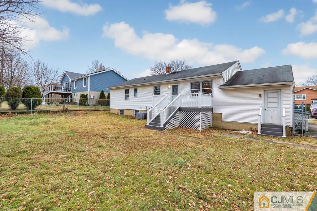 6 Birch Road Edison, NJ 08817 - Photo 22 of 27 a view of a house with a yard and sitting area