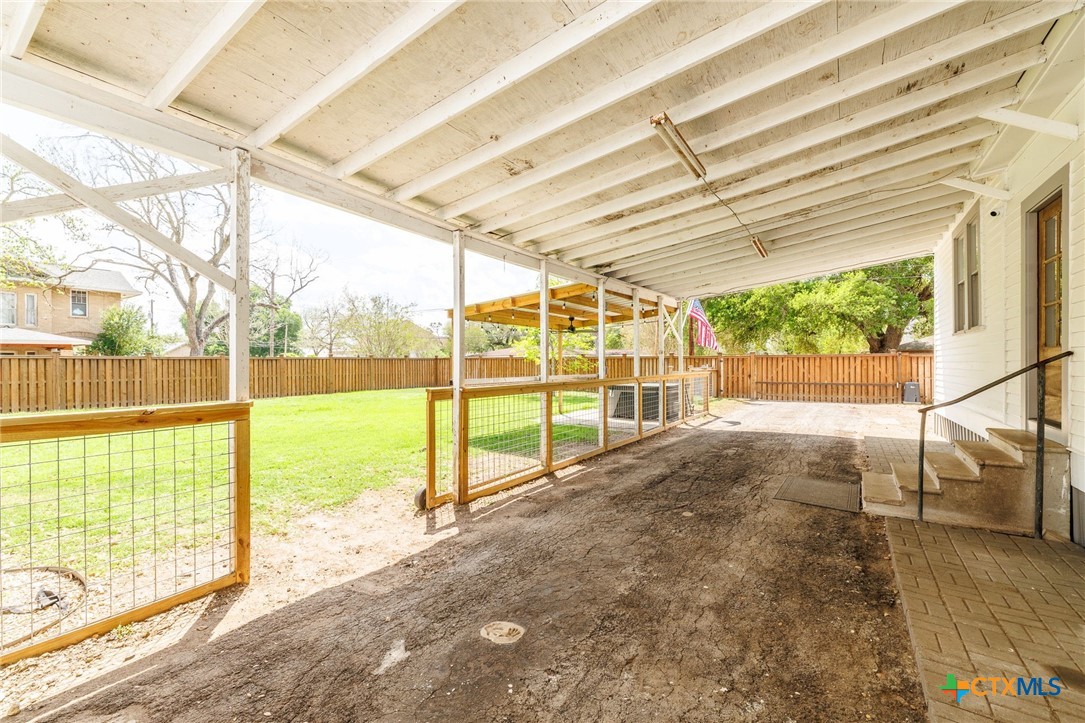 604 St Michael Street Gonzales, TX 78629 - Photo 32 of 37 a view of a backyard