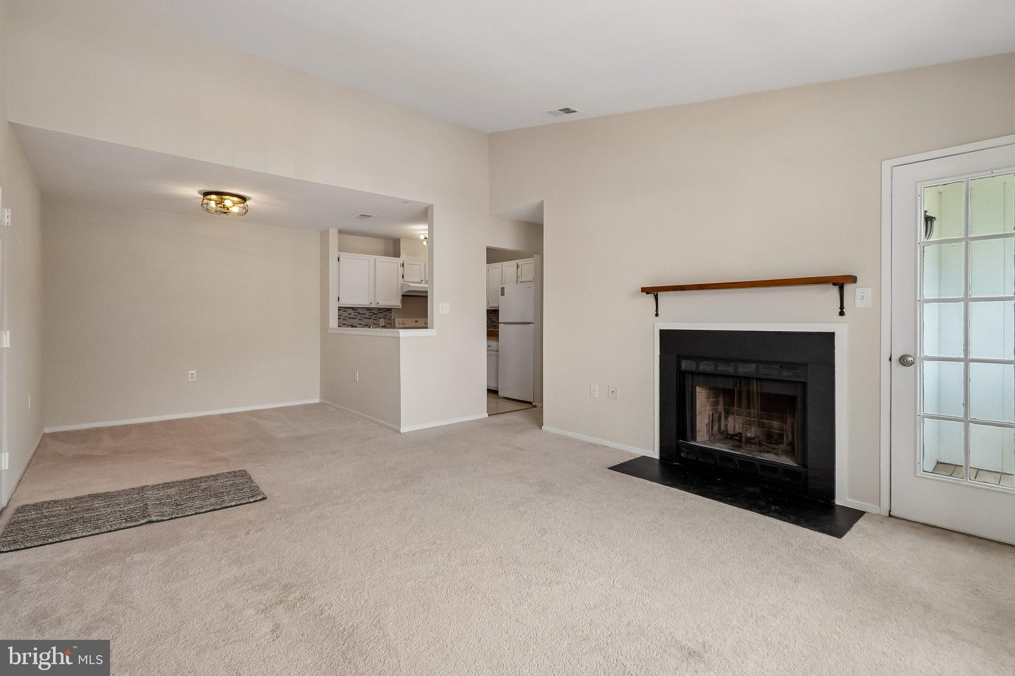 7822 Harrowgate Circle, Unit D Springfield, VA 22152 - Photo 5 of 28 Wood Burning Fireplace