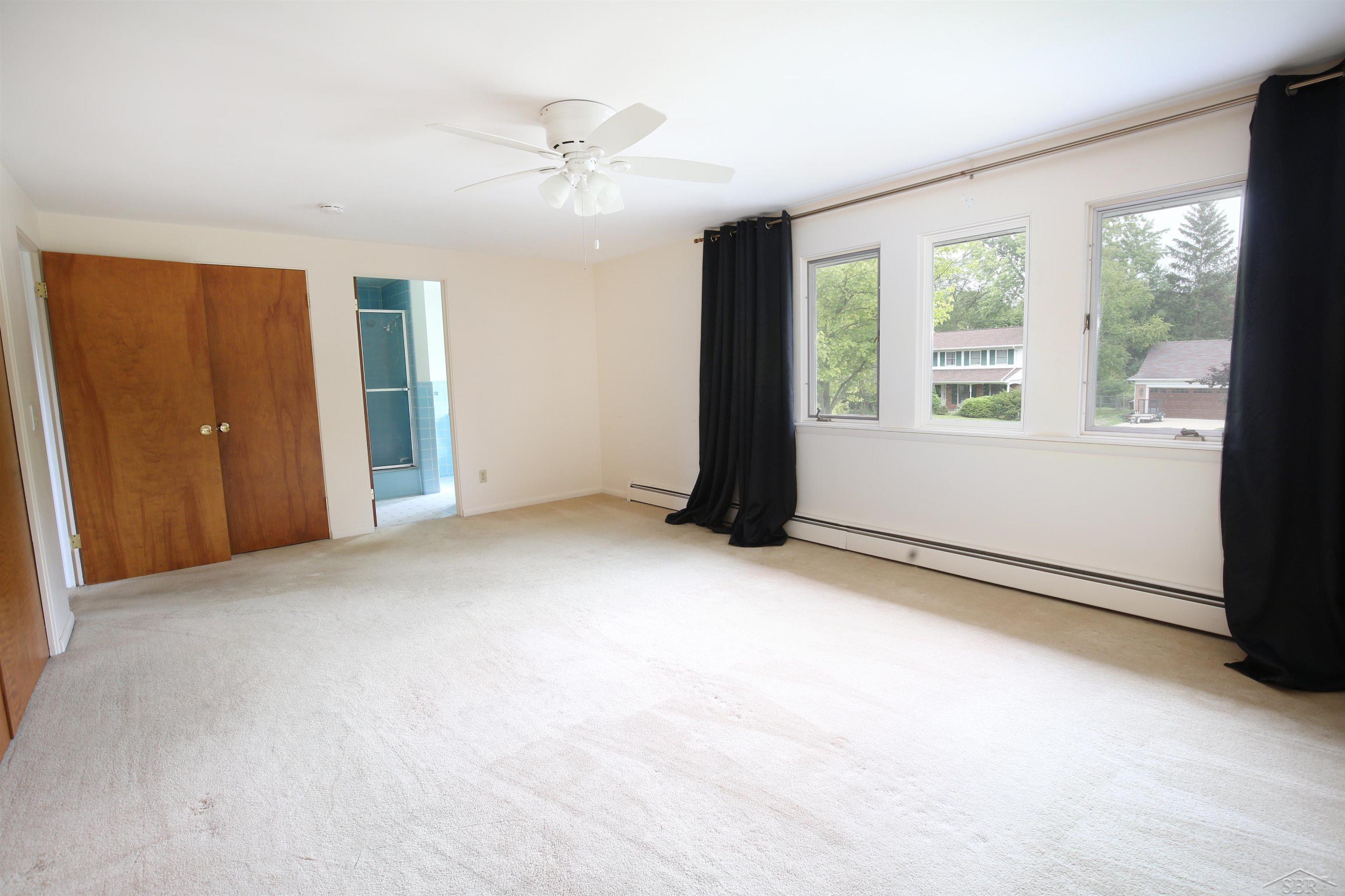 636 Stoneham Road Saginaw, MI 48638 - Photo 30 of 54 Master w/ 3 Closets & Bat