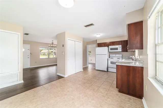 a view of a kitchen with a sink