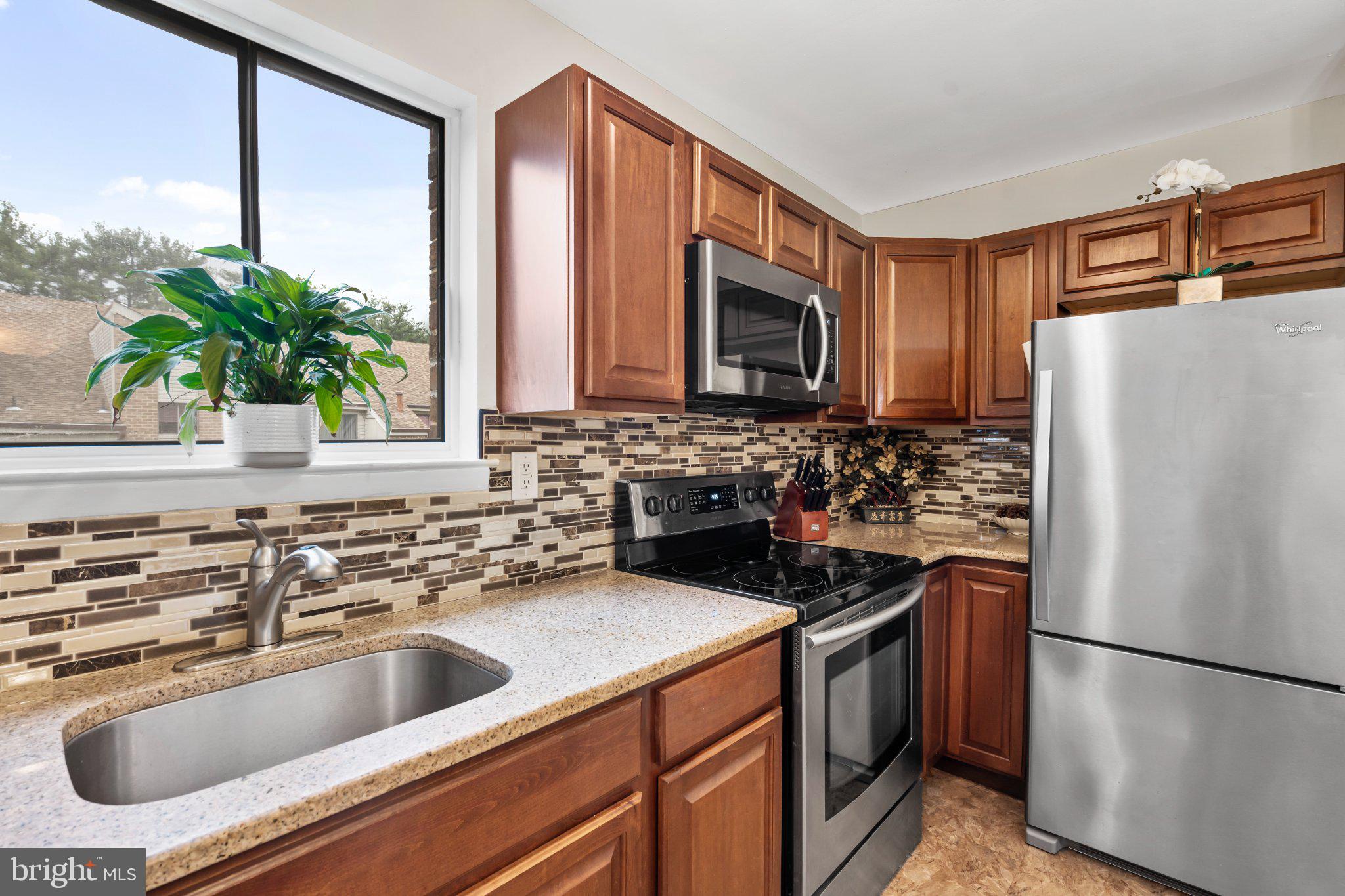 1475 Mt Holly Road, Unit F2 Edgewater Park, NJ 08010 - Photo 15 of 32 Modern kitchen with stylish finishes.