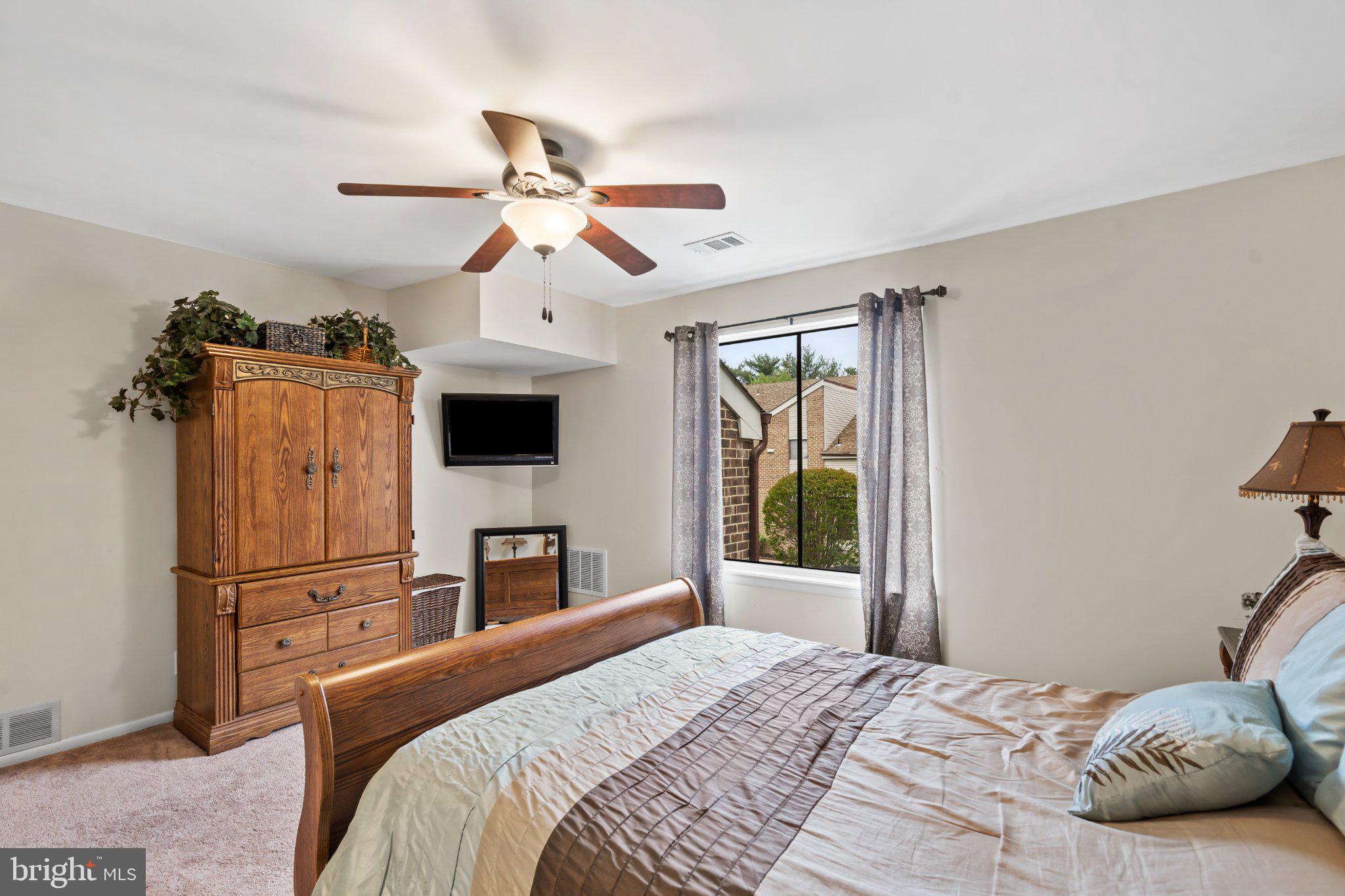 1475 Mt Holly Road, Unit F2 Edgewater Park, NJ 08010 - Photo 22 of 32 Serene bedroom with natural light.