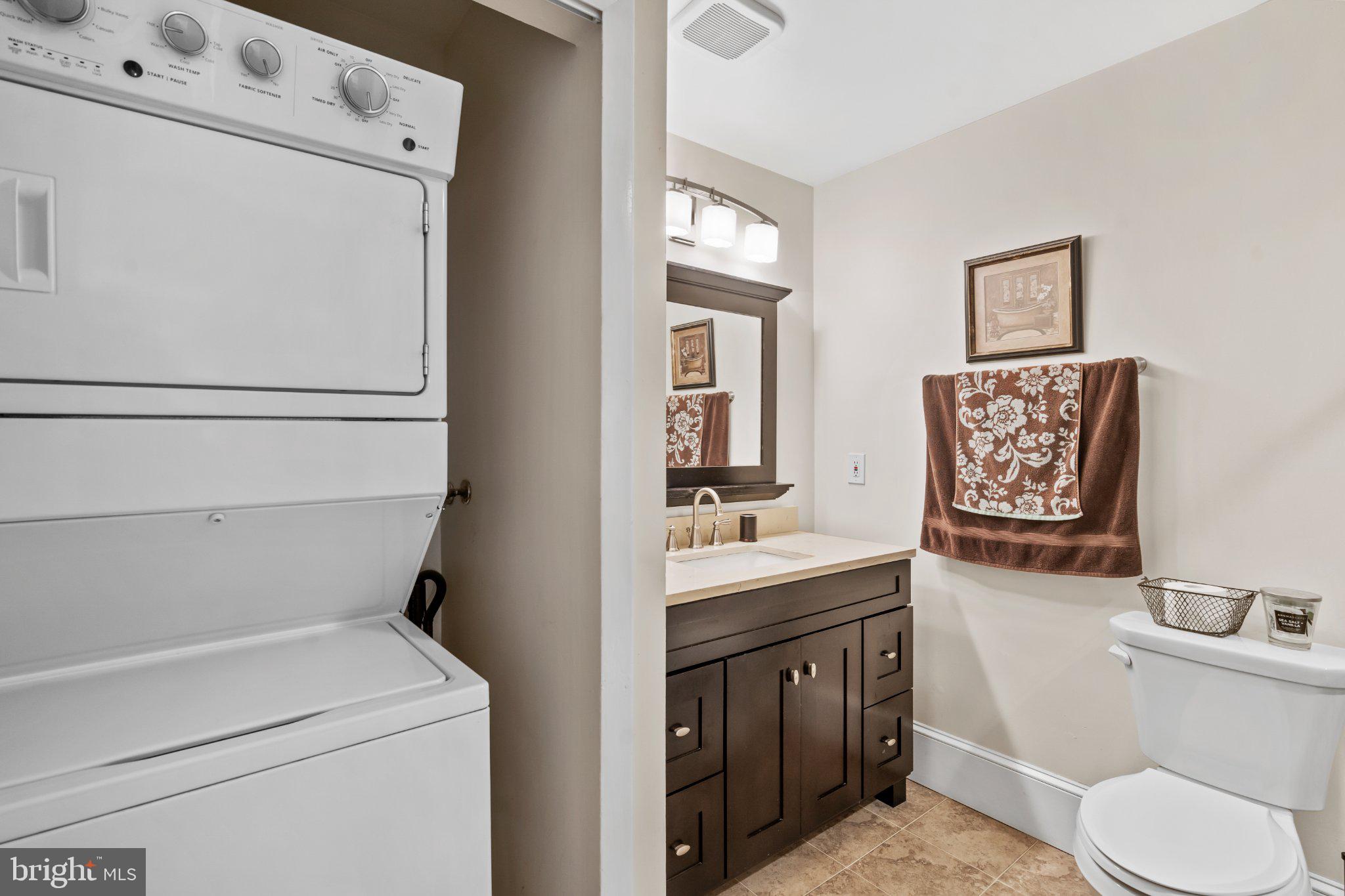1475 Mt Holly Road, Unit F2 Edgewater Park, NJ 08010 - Photo 26 of 32 Stylish laundry and bath combo space.
