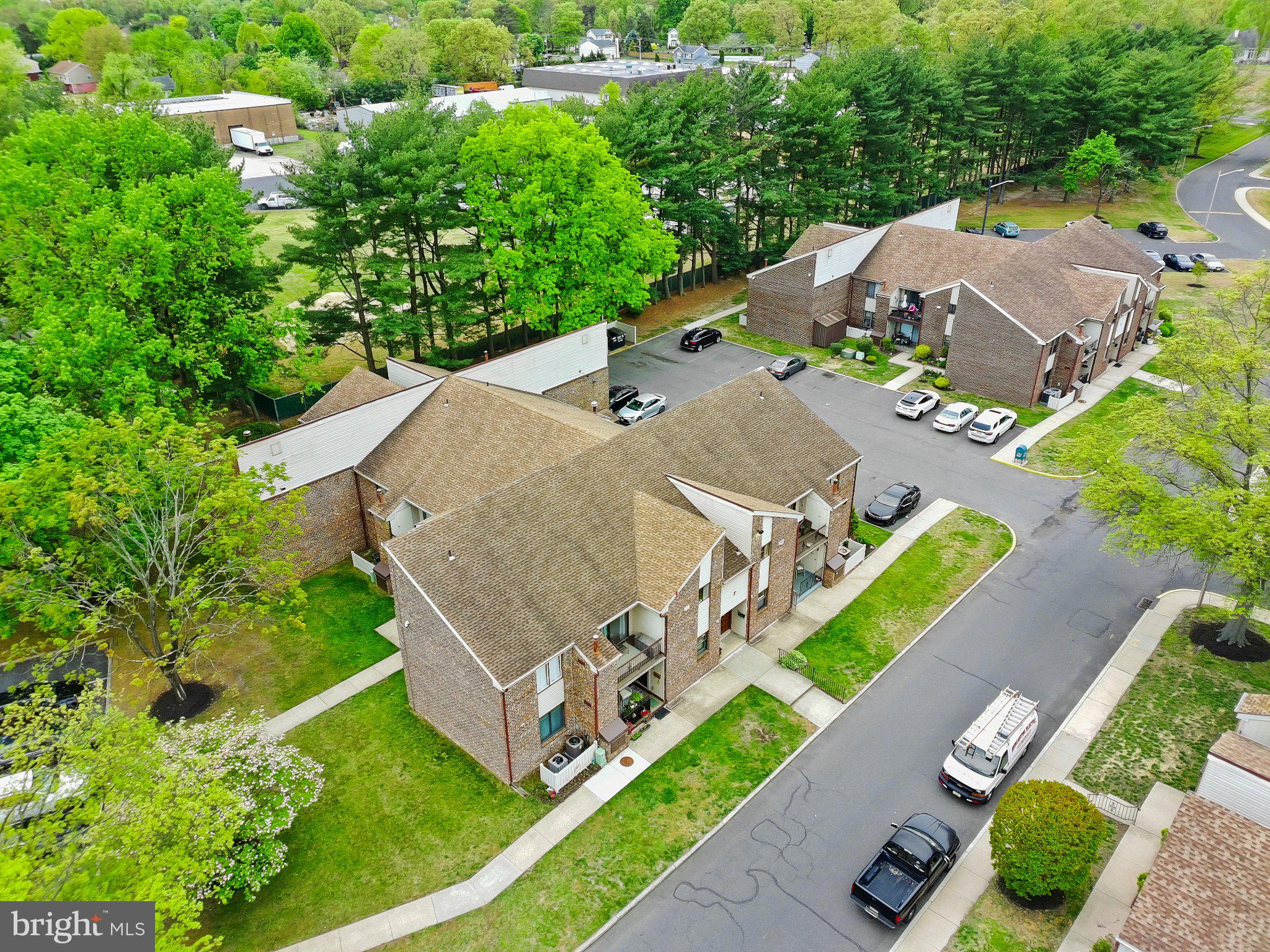1475 Mt Holly Road, Unit F2 Edgewater Park, NJ 08010 - Photo 29 of 32 Charming community with lush greenery.