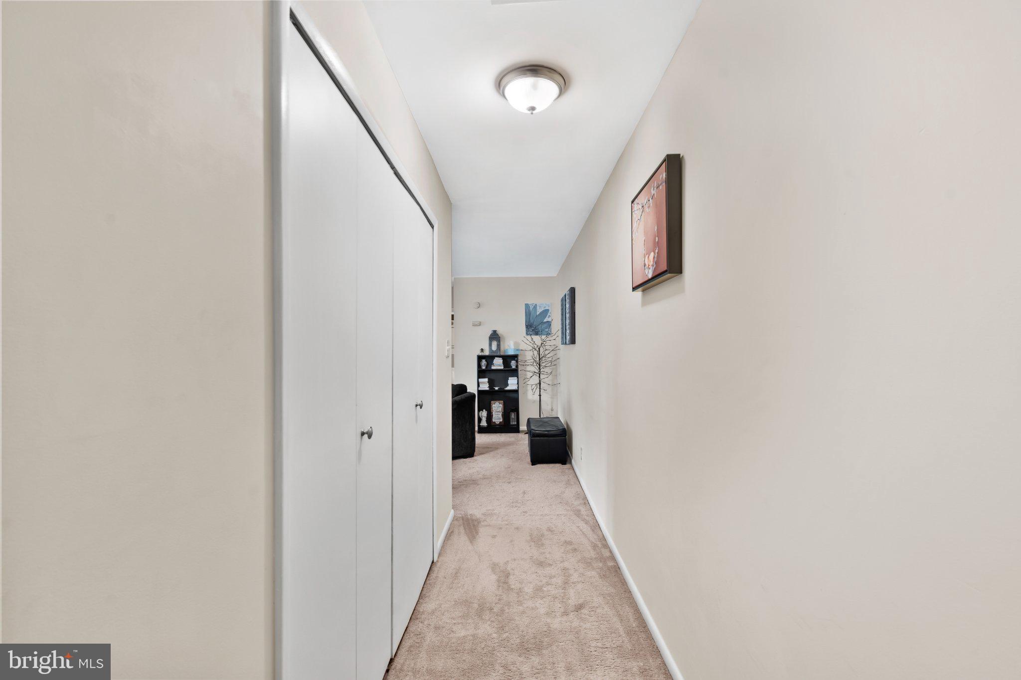 1475 Mt Holly Road, Unit F2 Edgewater Park, NJ 08010 - Photo 5 of 32 Inviting hallway with soft tones.