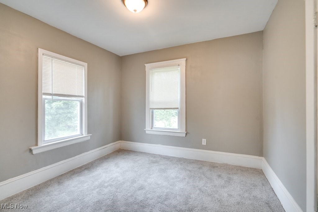 1261 Rozelle Avenue Cleveland, OH 44112 - Photo 20 of 32 View of carpeted empty room