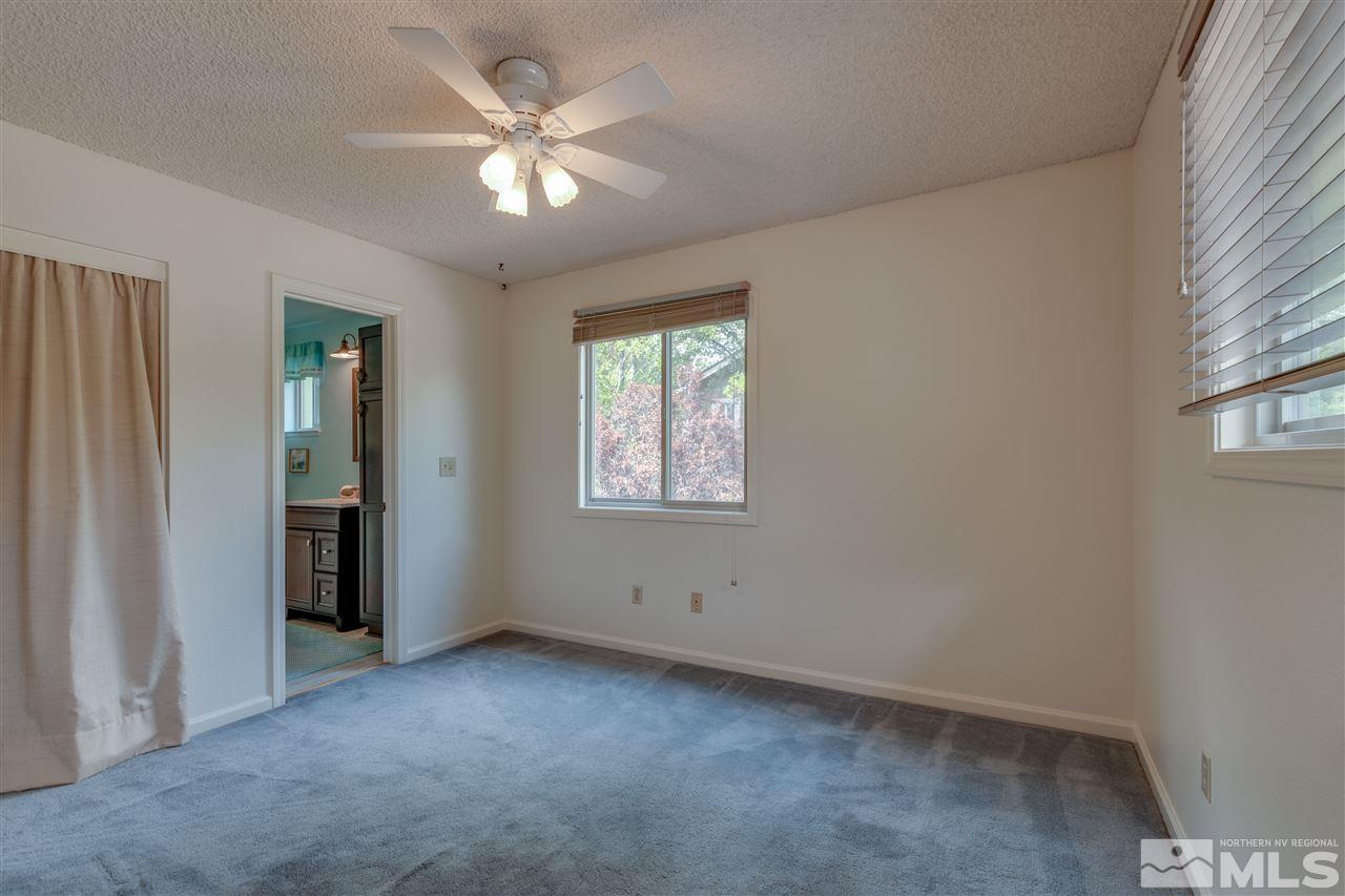200 Gooseberry Drive Reno, NV 89523 - Photo 18 of 25 an empty room with windows and fan
