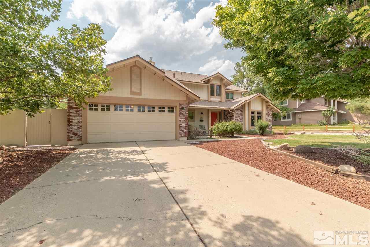 200 Gooseberry Drive Reno, NV 89523 - Photo 2 of 25 a front view of a house with a garden