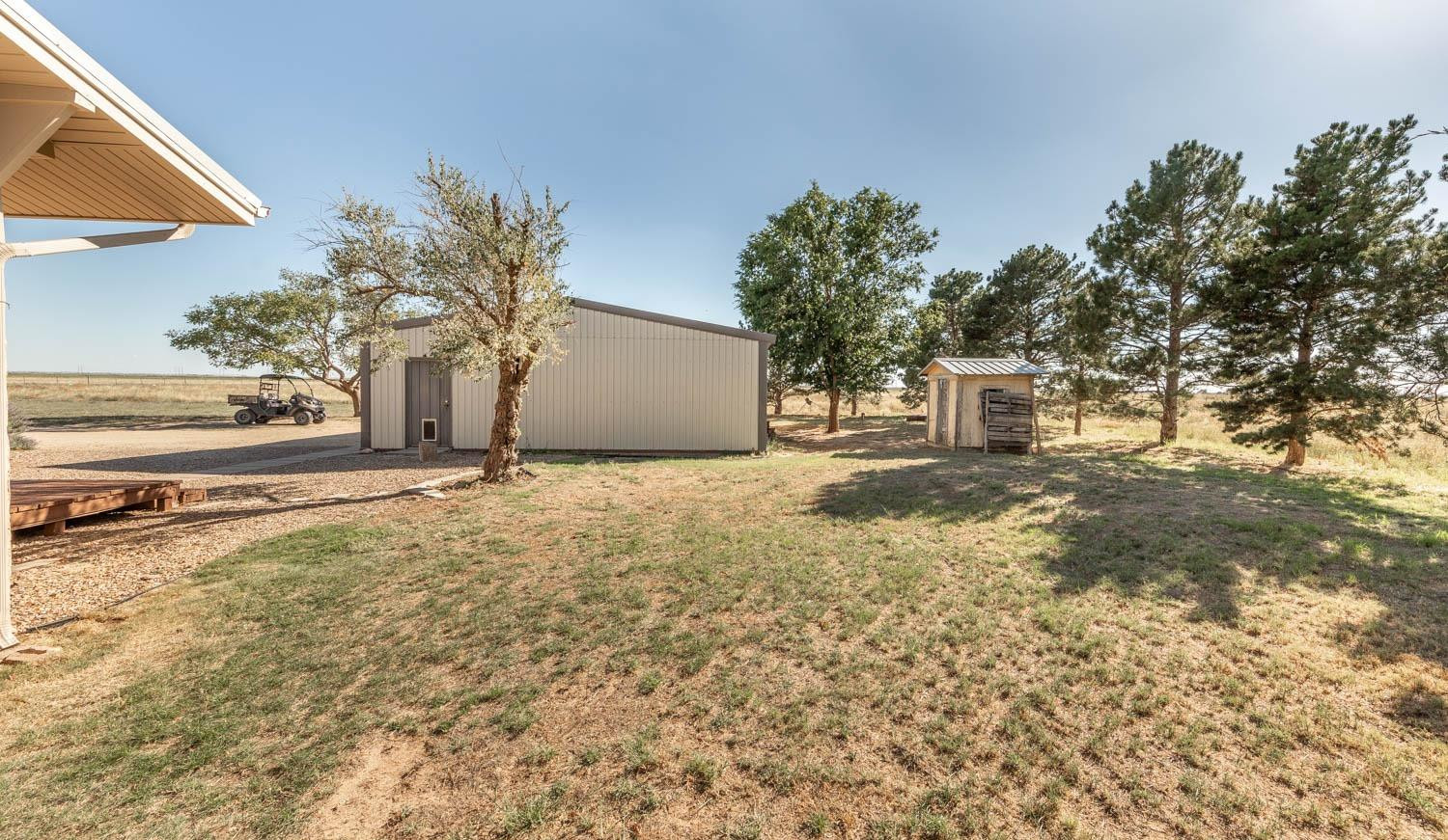 632 FM 3269 Muleshoe, TX 79347 - Photo 26 of 48 a view of a house with a yard