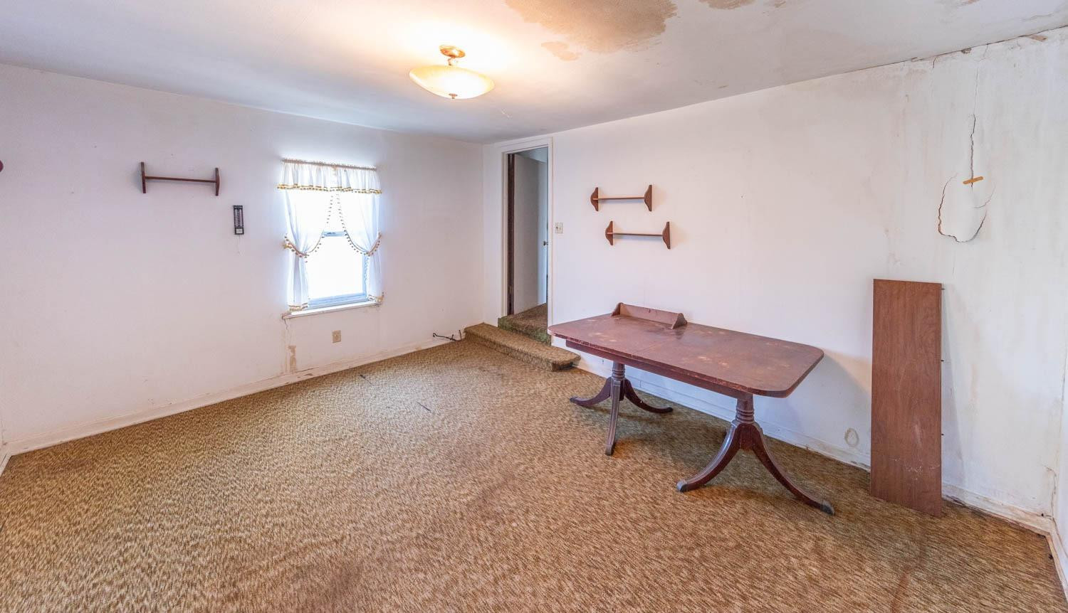 632 FM 3269 Muleshoe, TX 79347 - Photo 37 of 48 a room with furniture and a window