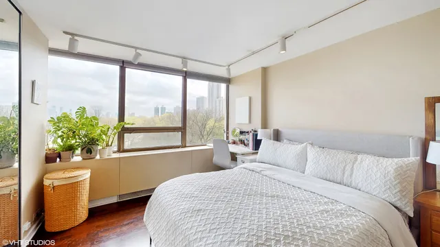 a bedroom with a bed and a walk in closet