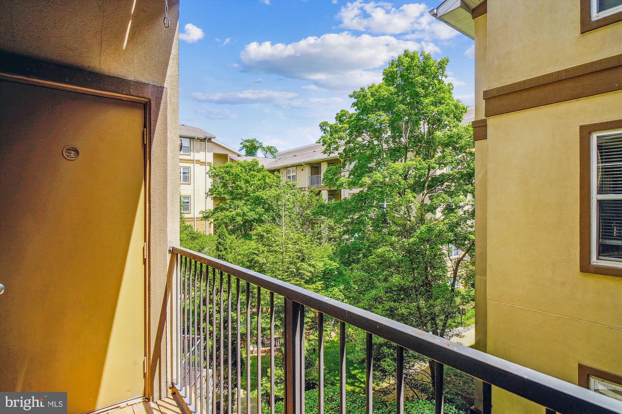 11750 Old Georgetown Road, Unit 2311 Rockville, MD 20852 - Photo 26 of 58 Balcony overlooks the lushly landscaped courtyard