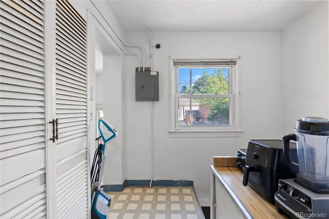 a room with furniture and a window