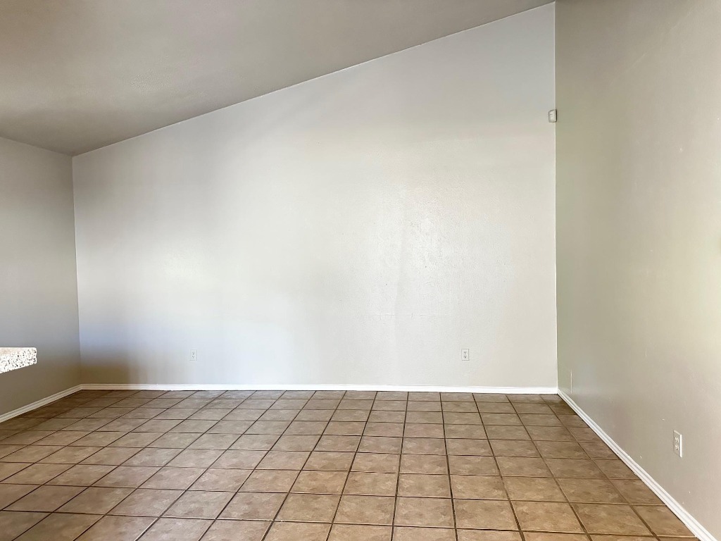 1102 Hickory Grove Drive, Unit B Austin, TX 78753 - Photo 2 of 14 a view of an empty room