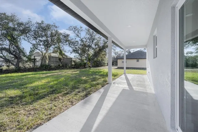 a view of a house with a big yard