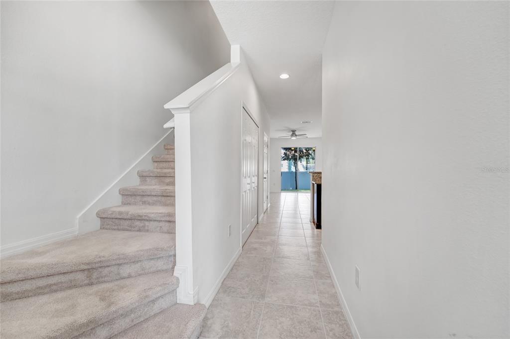 4824 Poolside Drive St. Cloud, FL 34769 - Photo 10 of 29 a view of hallway with stairs