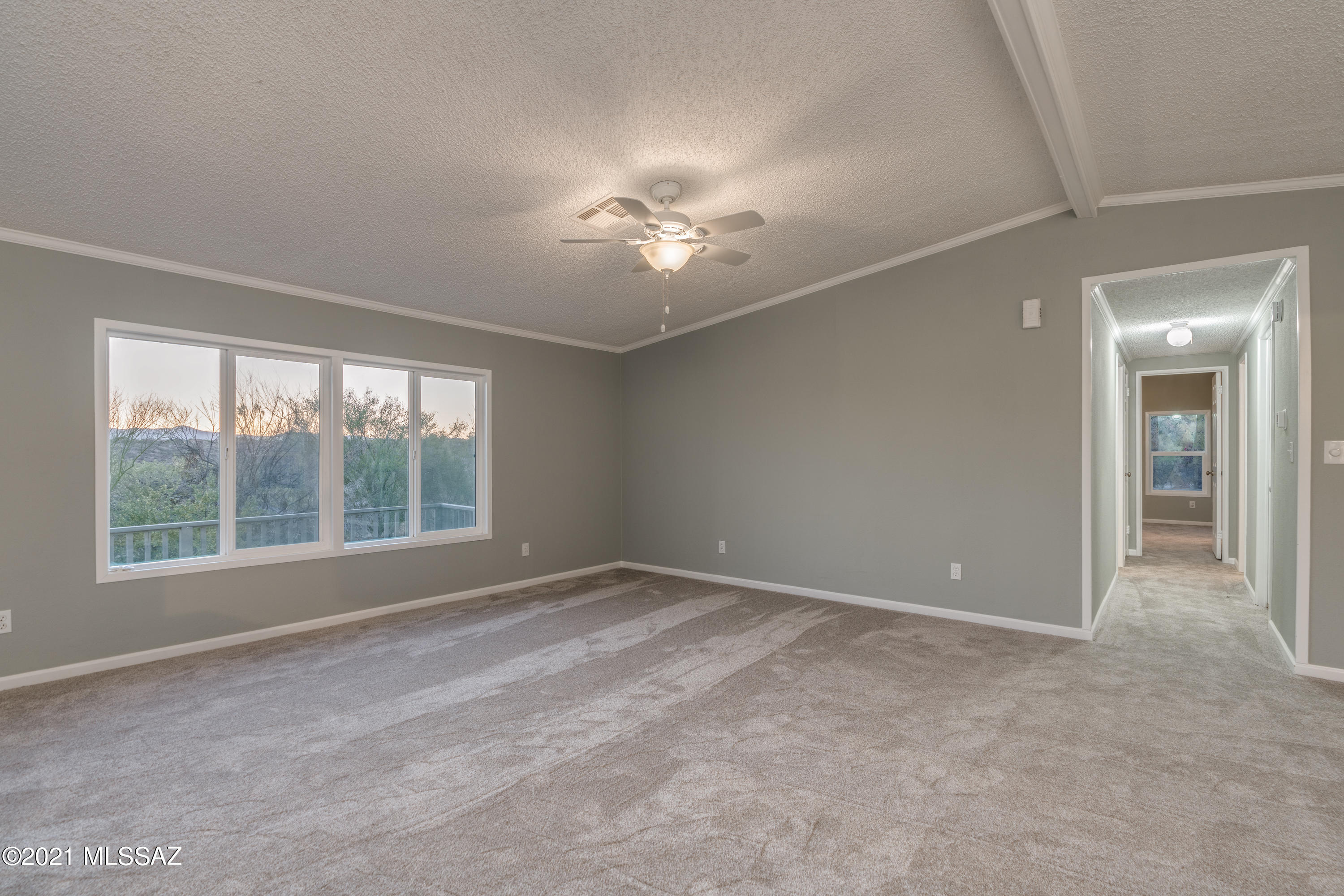 4489 East Wilds Road Tucson, AZ 85739 - Photo 15 of 50 a view of an empty room with a window