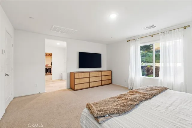 a bathroom with a double vanity sink and mirror