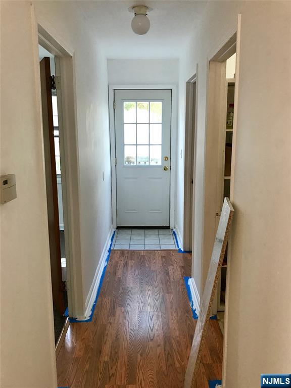1 Cedar Lane Paramus, NJ 07652 - Photo 8 of 13 wooden floor in an empty room with a window