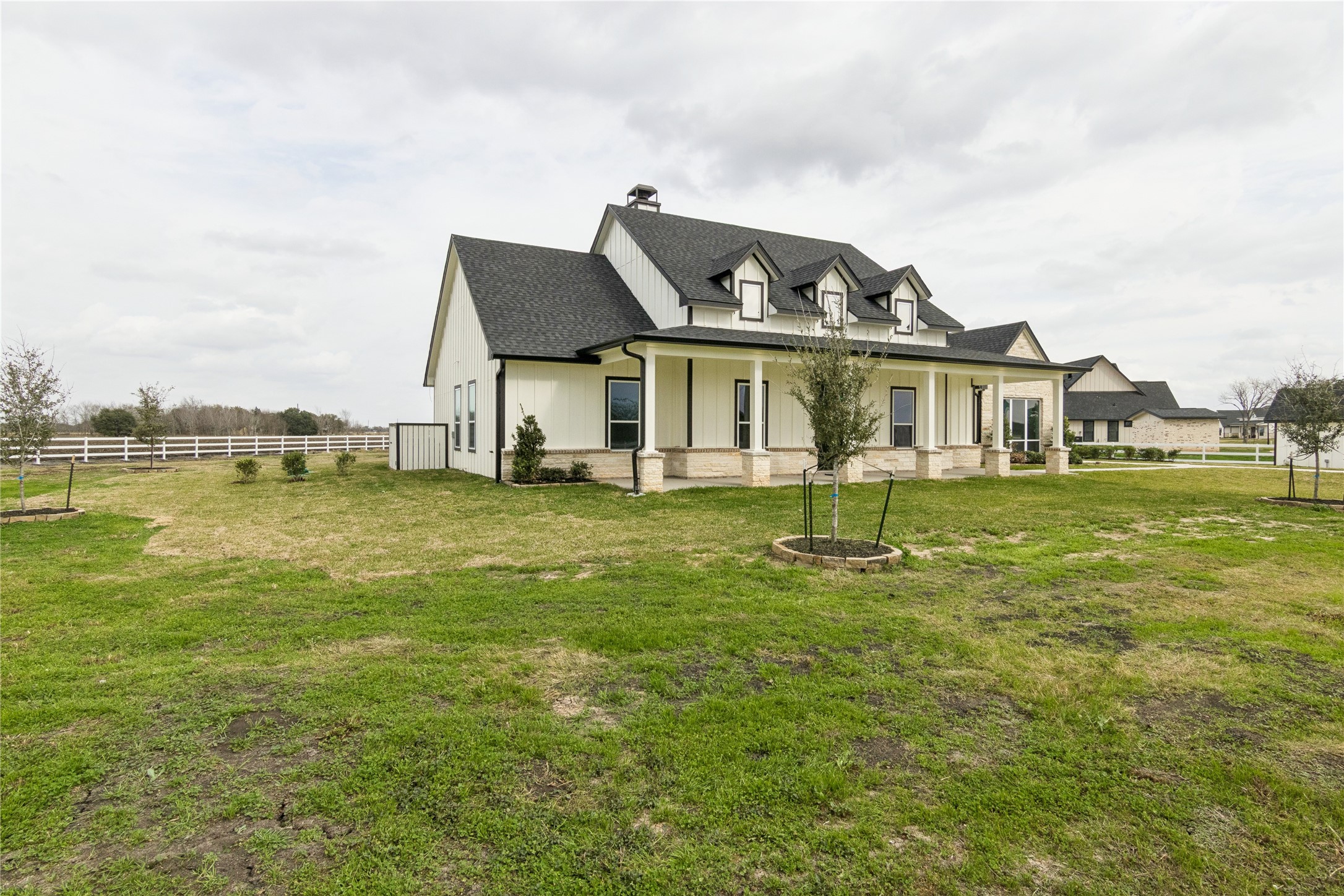 5766 Ward Bend Road Sealy, TX 77474 - Photo 2 of 45 a front view of a house with a yard