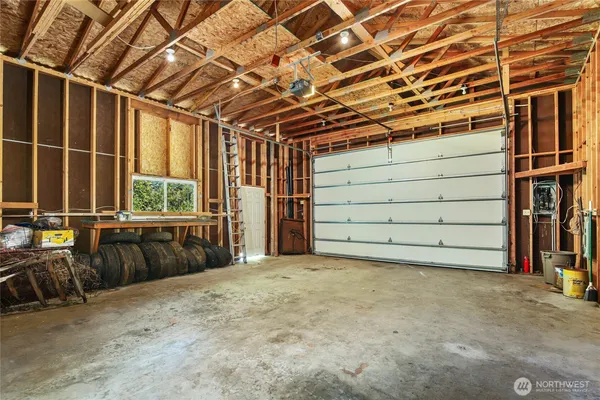 a view of a room with wooden walls