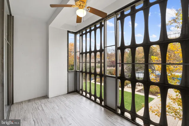 a view of an entryway with hardwood and door