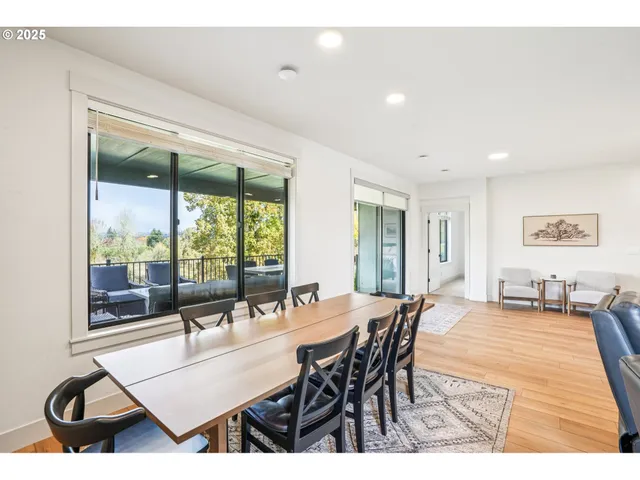 a view of a dining room with furniture window and outside view