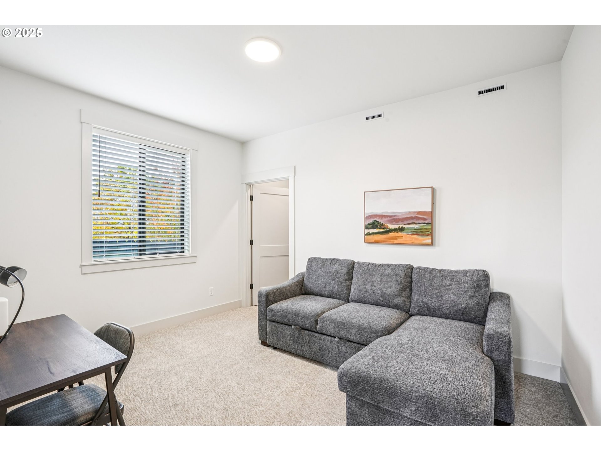 1708 Northwest 21st Way Battle Ground, WA 98604 - Photo 17 of 36 a living room with furniture and a window