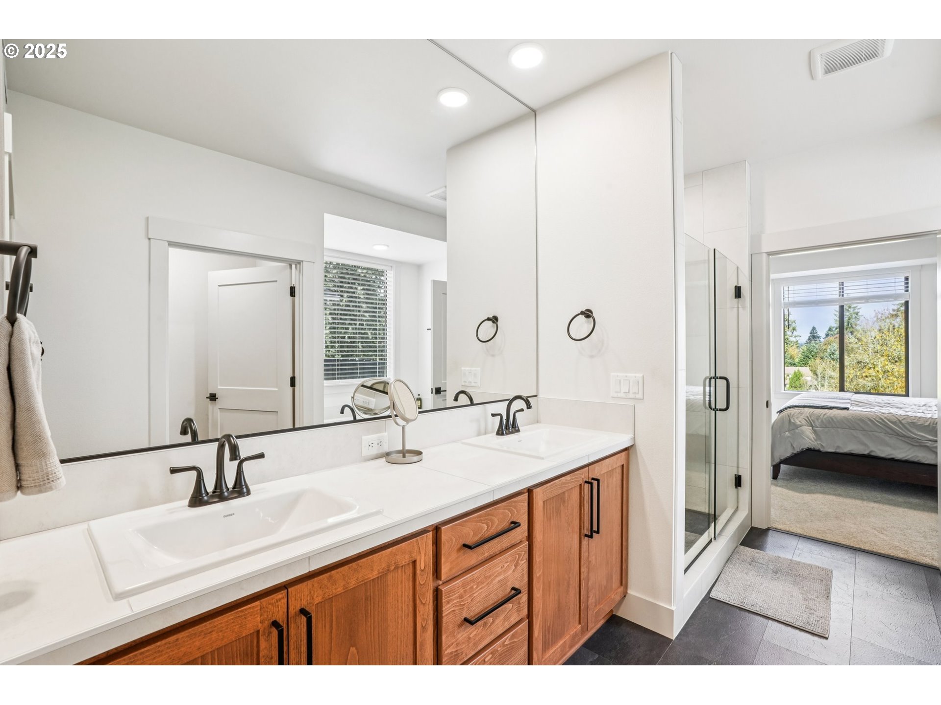 1708 Northwest 21st Way Battle Ground, WA 98604 - Photo 21 of 36 a spacious bathroom with a double vanity sink mirror and double
