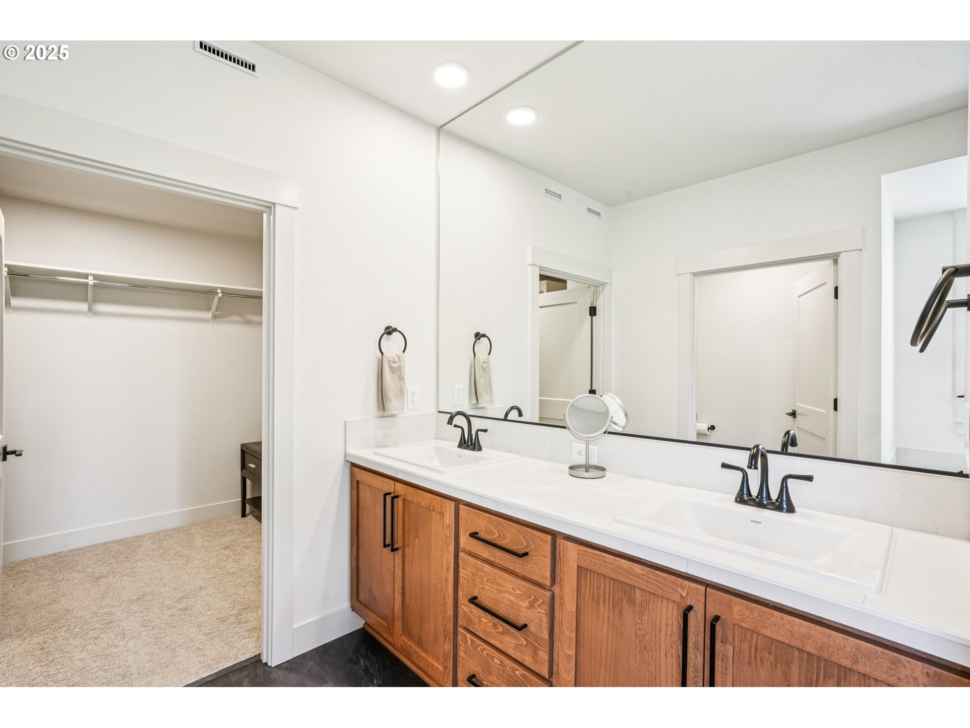 1708 Northwest 21st Way Battle Ground, WA 98604 - Photo 22 of 36 a bathroom with a sink double vanity and a mirror
