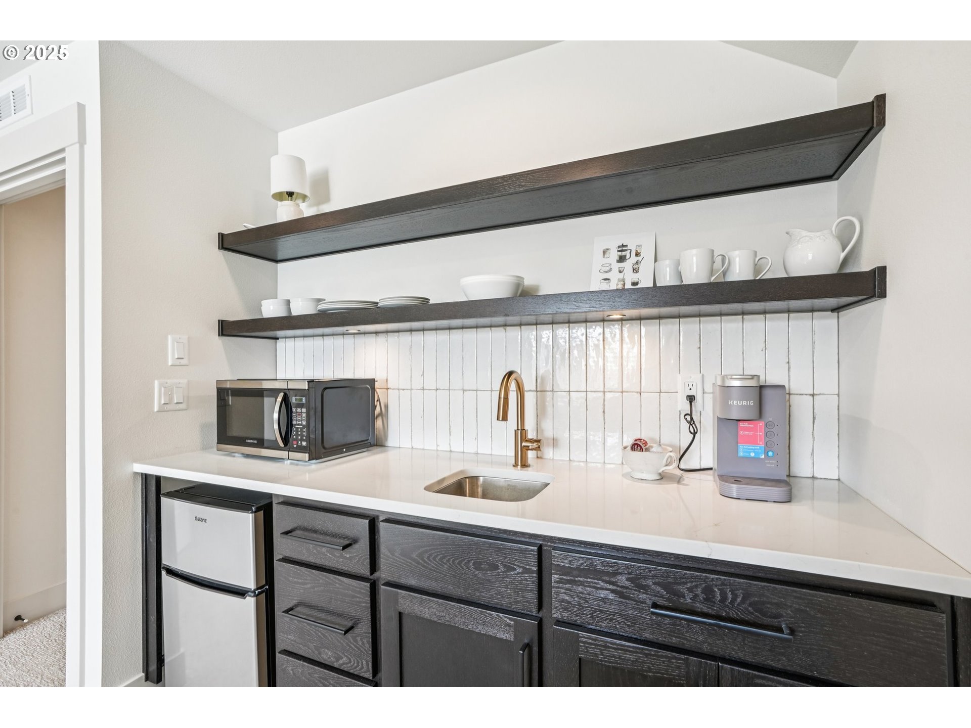 1708 Northwest 21st Way Battle Ground, WA 98604 - Photo 25 of 36 a kitchen with a sink and cabinets