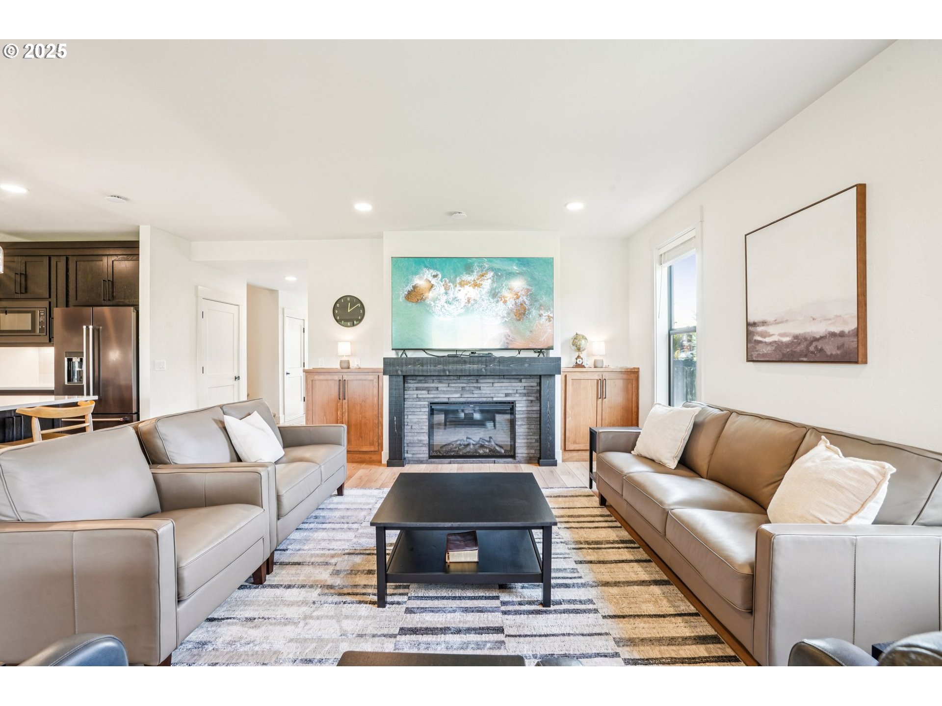 1708 Northwest 21st Way Battle Ground, WA 98604 - Photo 5 of 36 a living room with furniture and a fireplace