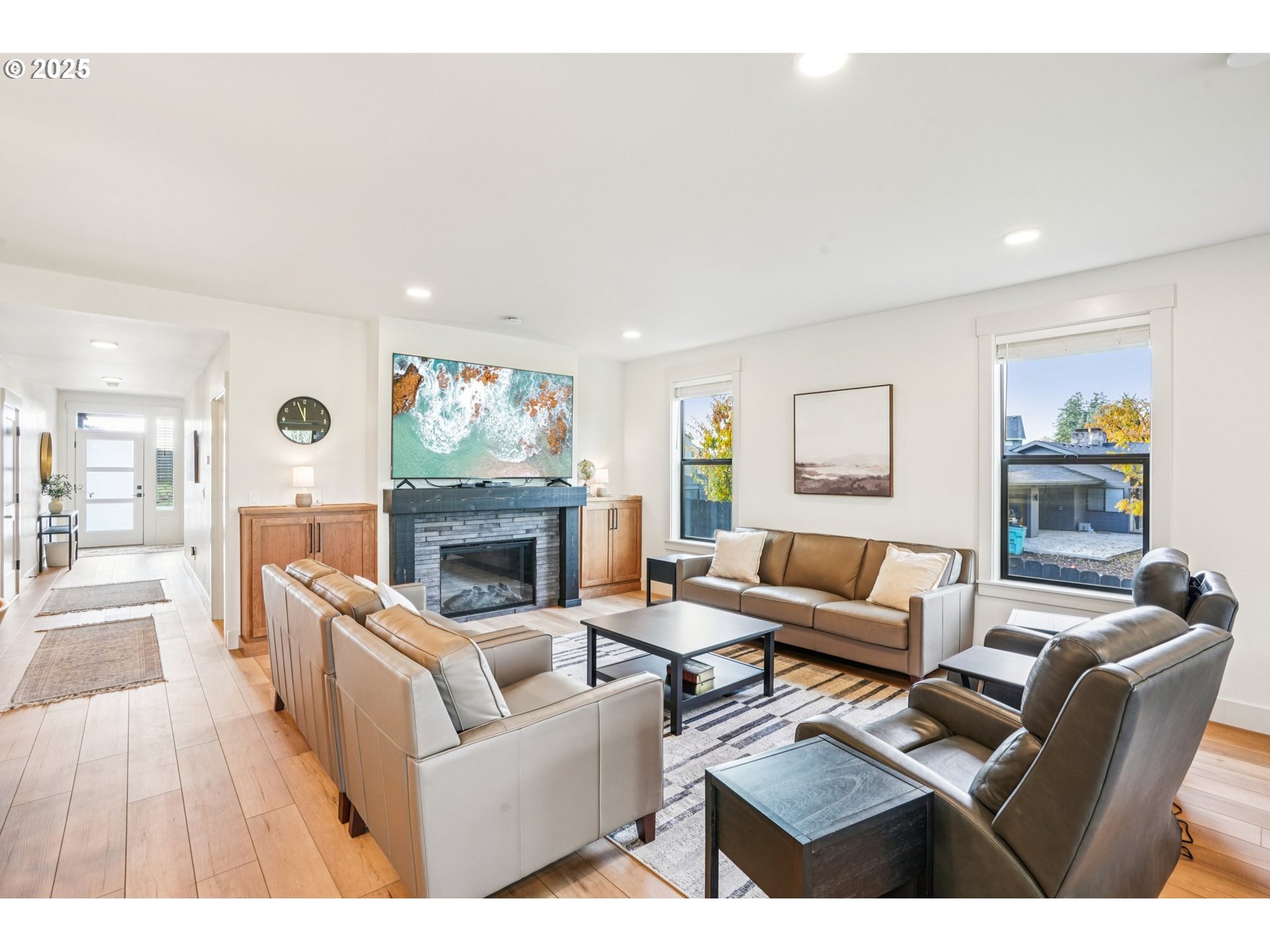 1708 Northwest 21st Way Battle Ground, WA 98604 - Photo 9 of 36 a living room with furniture and a fireplace