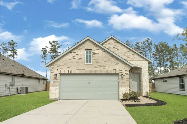 a front view of house with yard