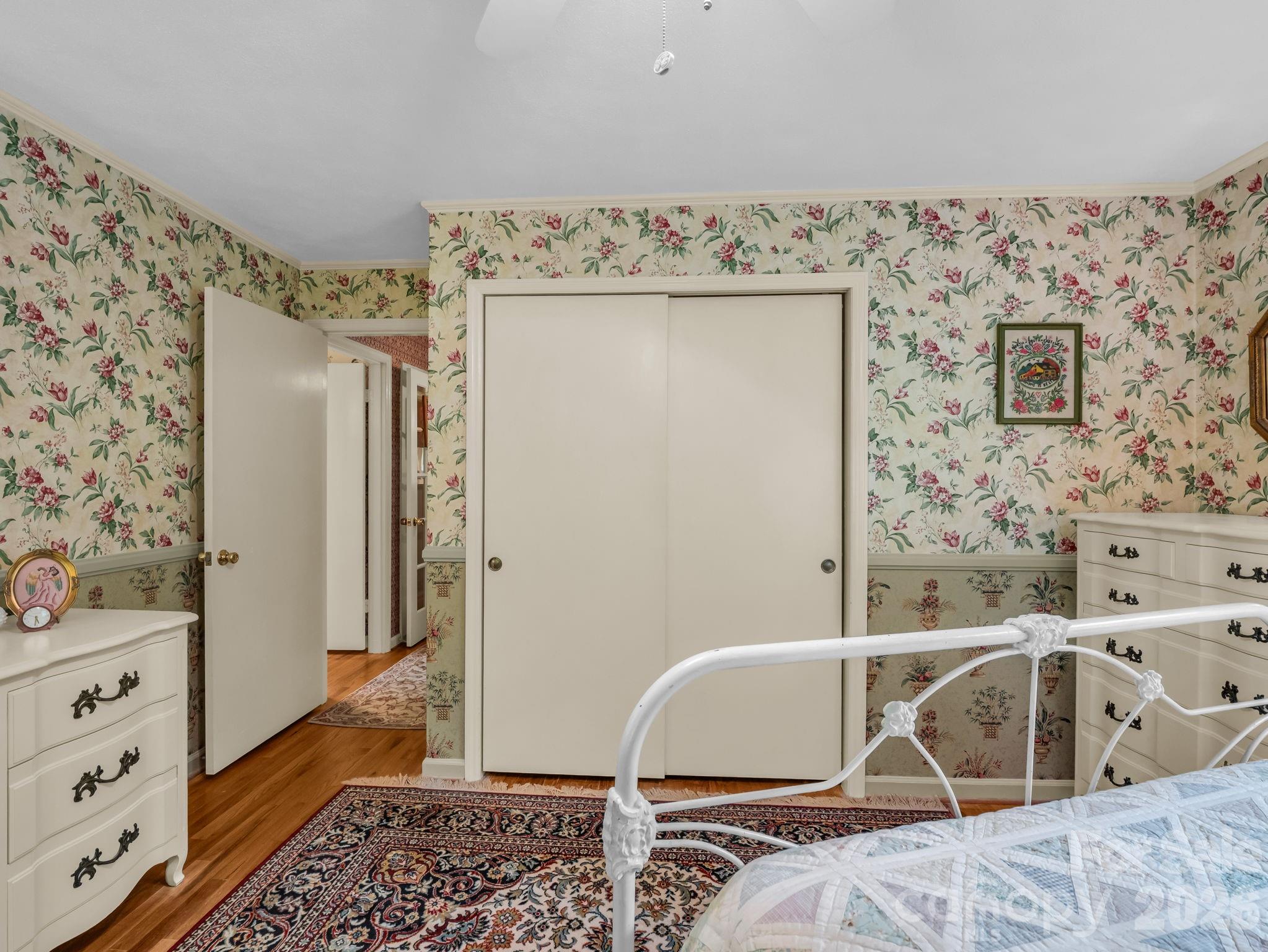 57 Tate Lane Tryon, NC 28782 - Photo 23 of 48 a room with a bed and a table in it