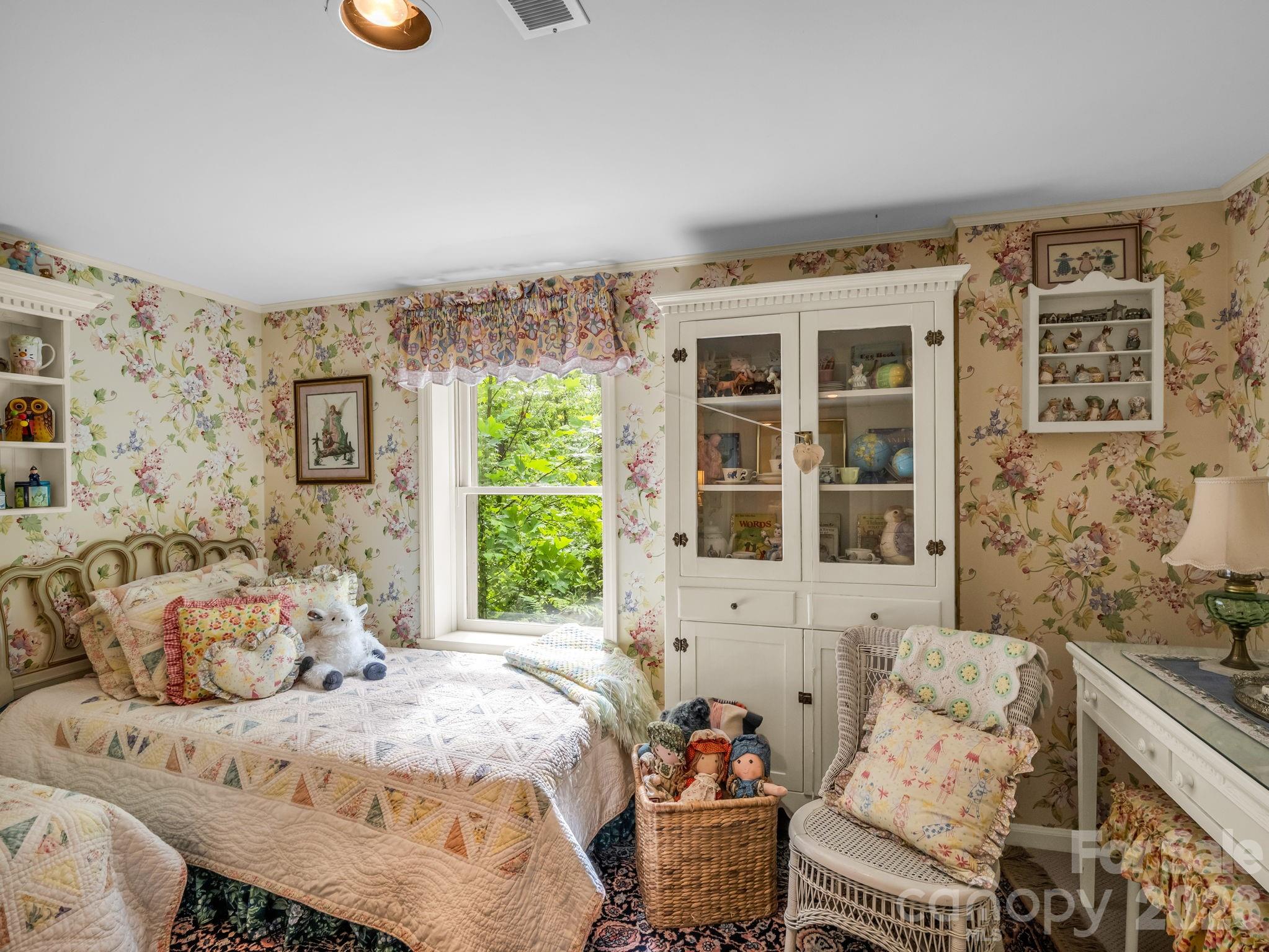 57 Tate Lane Tryon, NC 28782 - Photo 27 of 48 a bedroom with a bed and glass window