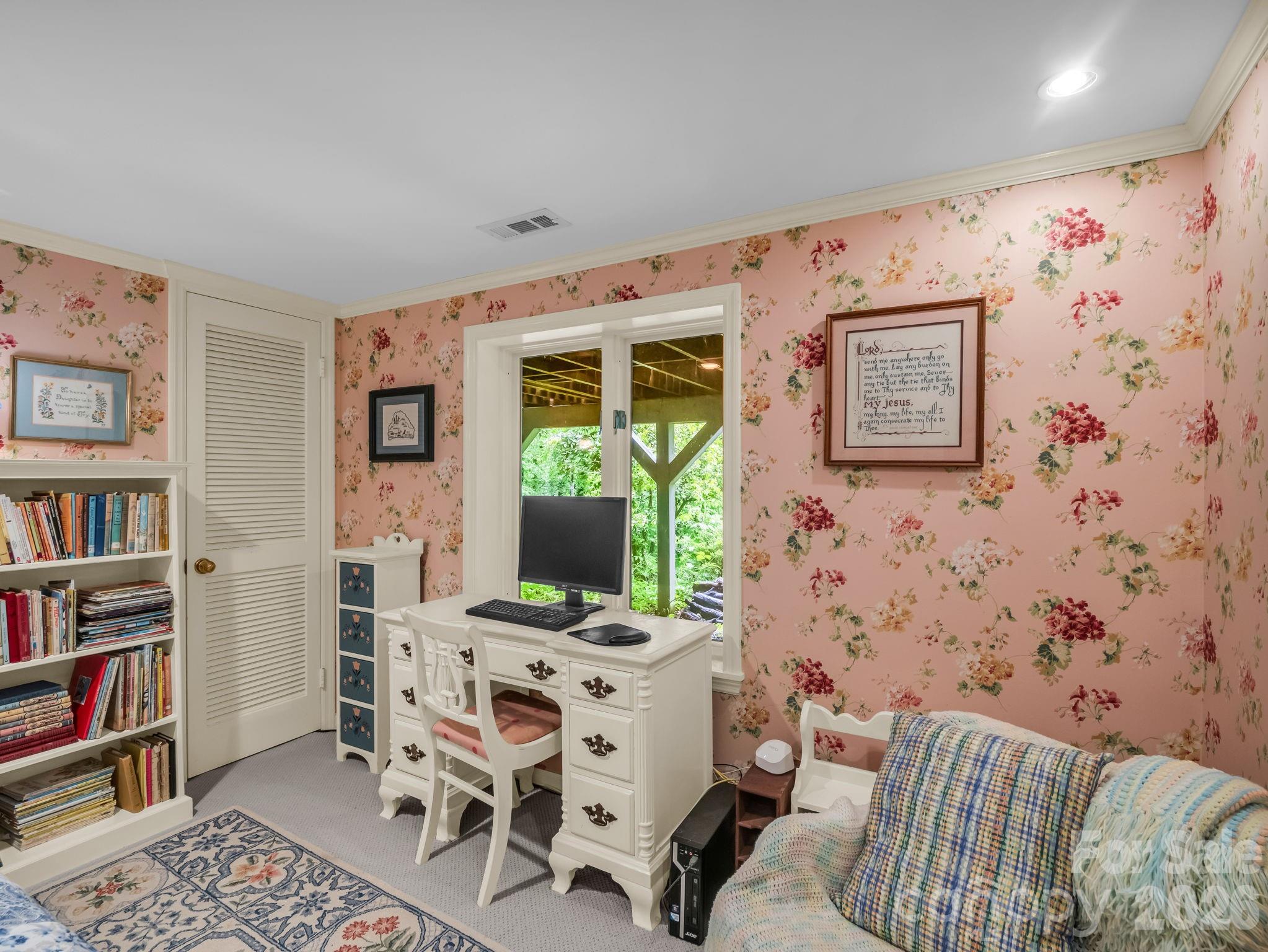 57 Tate Lane Tryon, NC 28782 - Photo 33 of 48 a living room with furniture and a book shelf