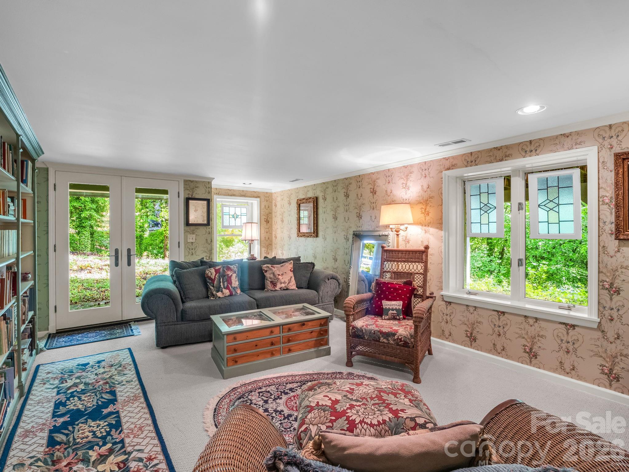 57 Tate Lane Tryon, NC 28782 - Photo 34 of 48 a living room with furniture and a large window