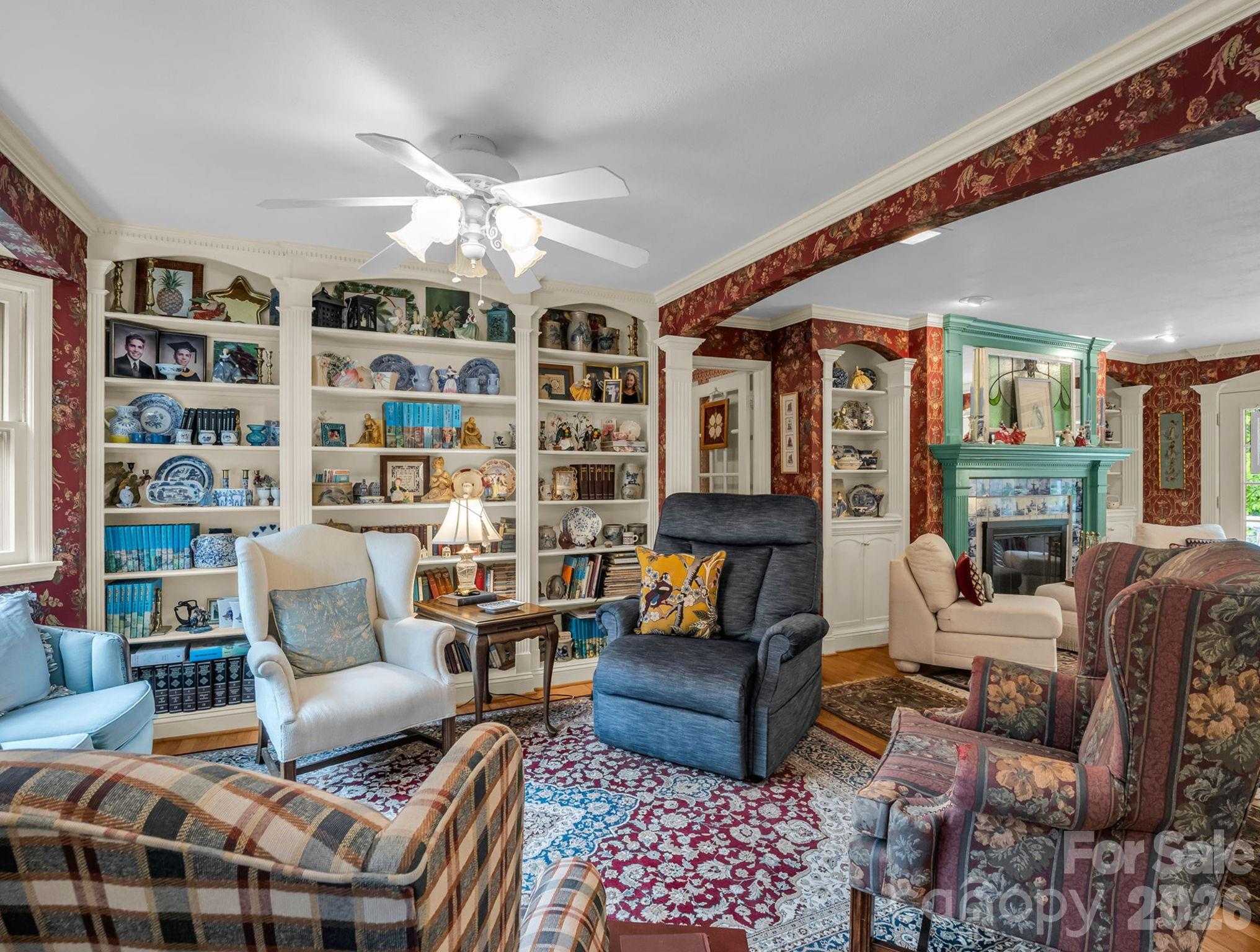57 Tate Lane Tryon, NC 28782 - Photo 4 of 48 a living room with furniture a rug and a chandelier