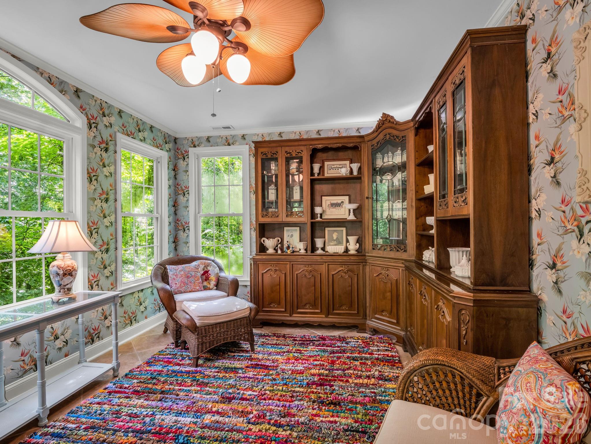 57 Tate Lane Tryon, NC 28782 - Photo 41 of 48 a living room with furniture and a floor to ceiling window