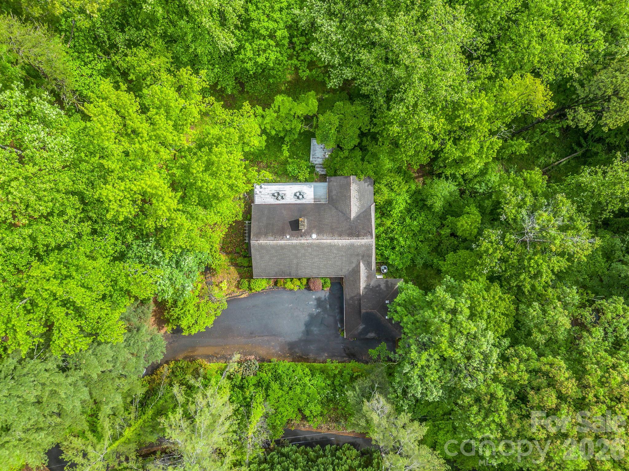 57 Tate Lane Tryon, NC 28782 - Photo 48 of 48 an aerial view of a house with a yard