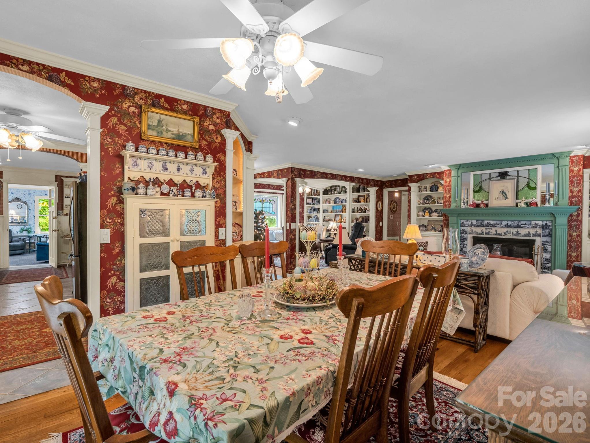 57 Tate Lane Tryon, NC 28782 - Photo 9 of 48 a view of a dining room with furniture window and wooden floor