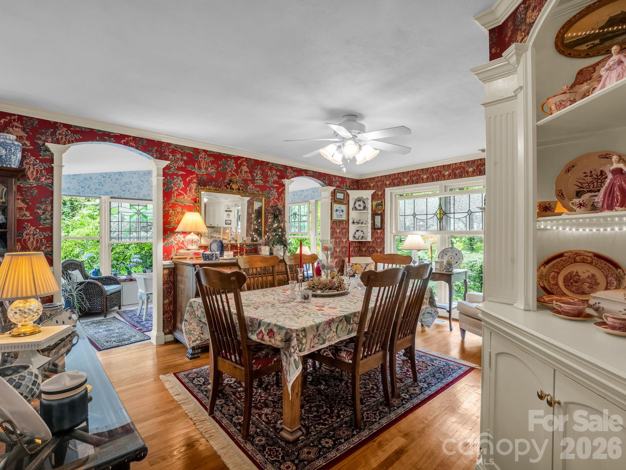 57 Tate Lane Tryon, NC 28782 - Photo 10 of 48 a view of a dining room with furniture a rug and wooden floor