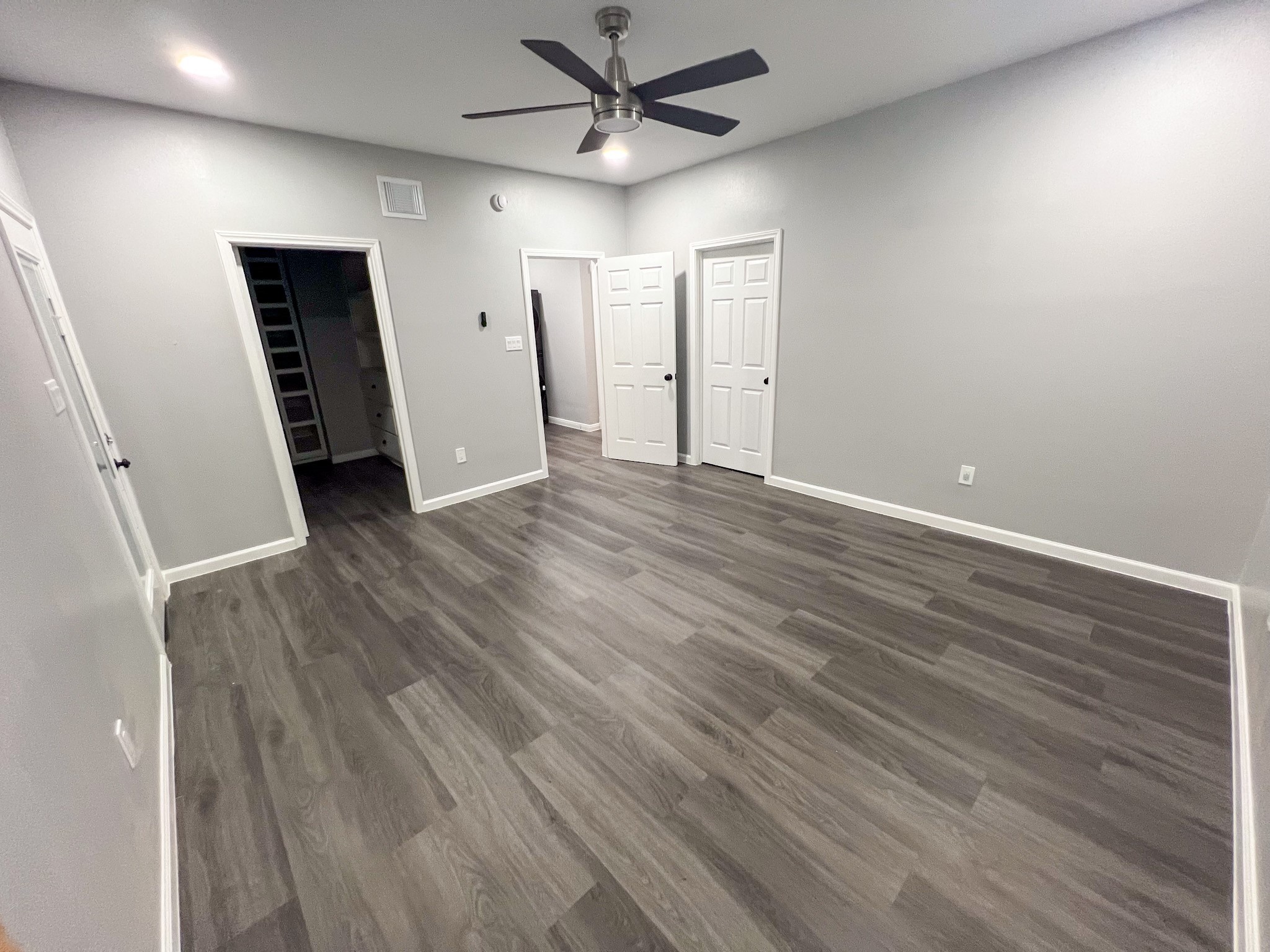 4605 Orange Street Houston, TX 77020 - Photo 13 of 28 wooden floor in an empty room with a window