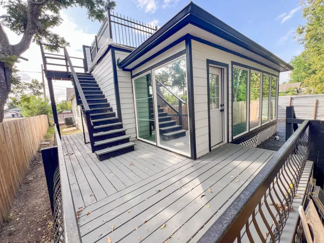 a view of outdoor space with deck and furniture