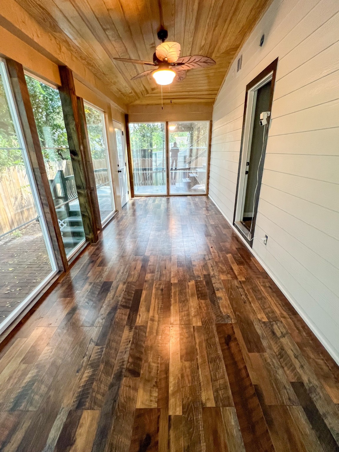 4605 Orange Street Houston, TX 77020 - Photo 7 of 28 a view of empty room with wooden floor and fan