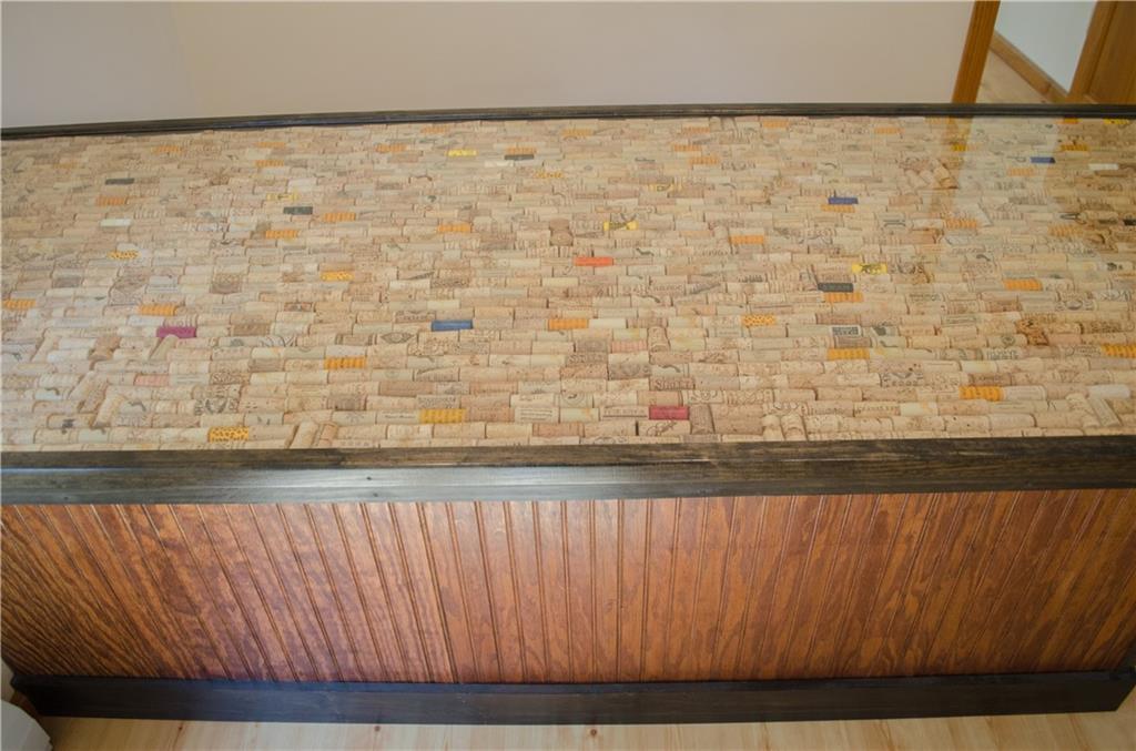 432 Bald Mountain Road Dedham, ME 04429 - Photo 6 of 35 Bar features a wine cork collection...